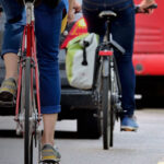 page banner - street traffic bikes and busses