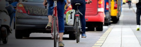 page banner - street traffic bikes and busses