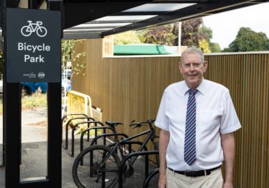 Councillor Graham McAndrew by cycle racks at Grange Paddocks image