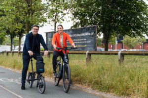 Andy Burnham, Mayor of Greater Manchester and Dame Sarah Storey riding e-bikes image