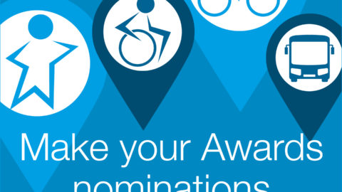 White text on blue background reads: Make your Awards nominations. Modeshift logo and illustrations of star shaped people travelling actively - on a bike, walking, wheeling and illustration of a bus.