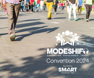 Group of people walking down a road, just their feet/legs in view. Modeshift Convention logo in the bottom right corner. Text reads: Modeshift Convention 2024. Sponsored by SMART Transport Hub.