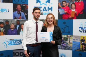University of Liverpool representative accepts certificate from Tom Murray - Modeshift display stand in background