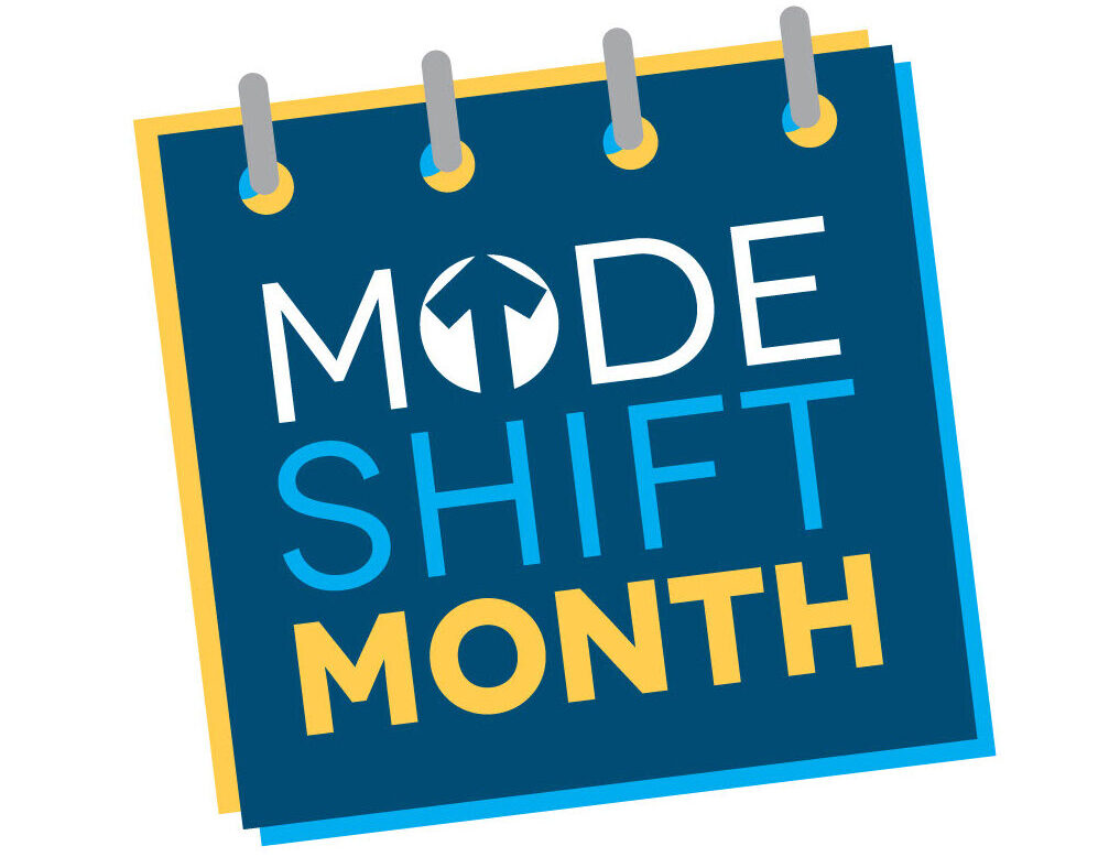 Mode Shift Month logo. Illustration of a calendar page. White, blue and yellow text reads: Mode Shift Month.