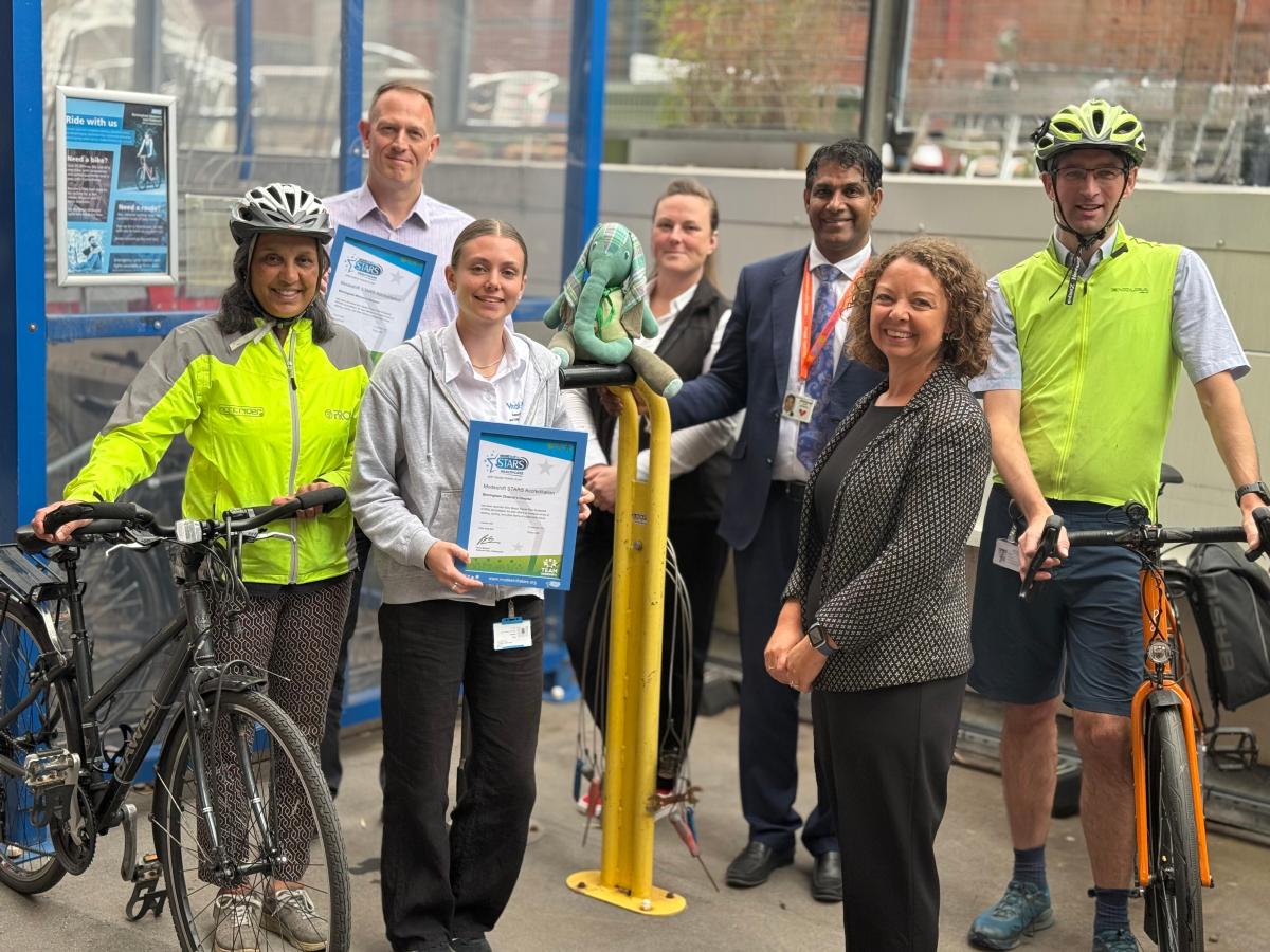 Cllr Majid Mahmood with some of the team from the NHS trust who have made the shift to cycling.