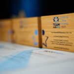 Team Modeshift Travel Awards lined up on a table