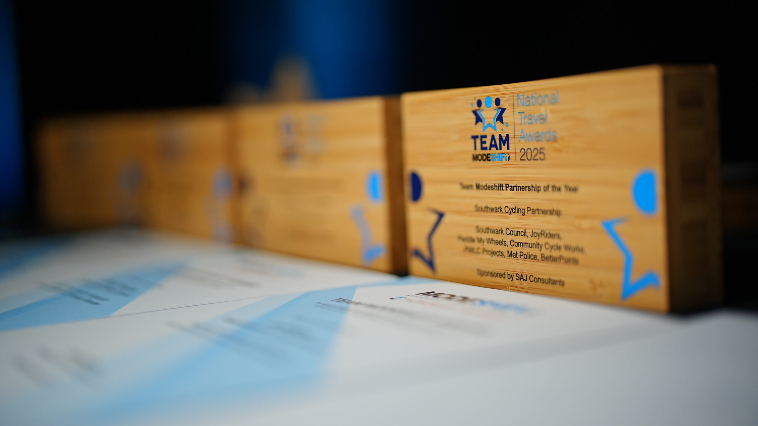 Team Modeshift Travel Awards lined up on a table