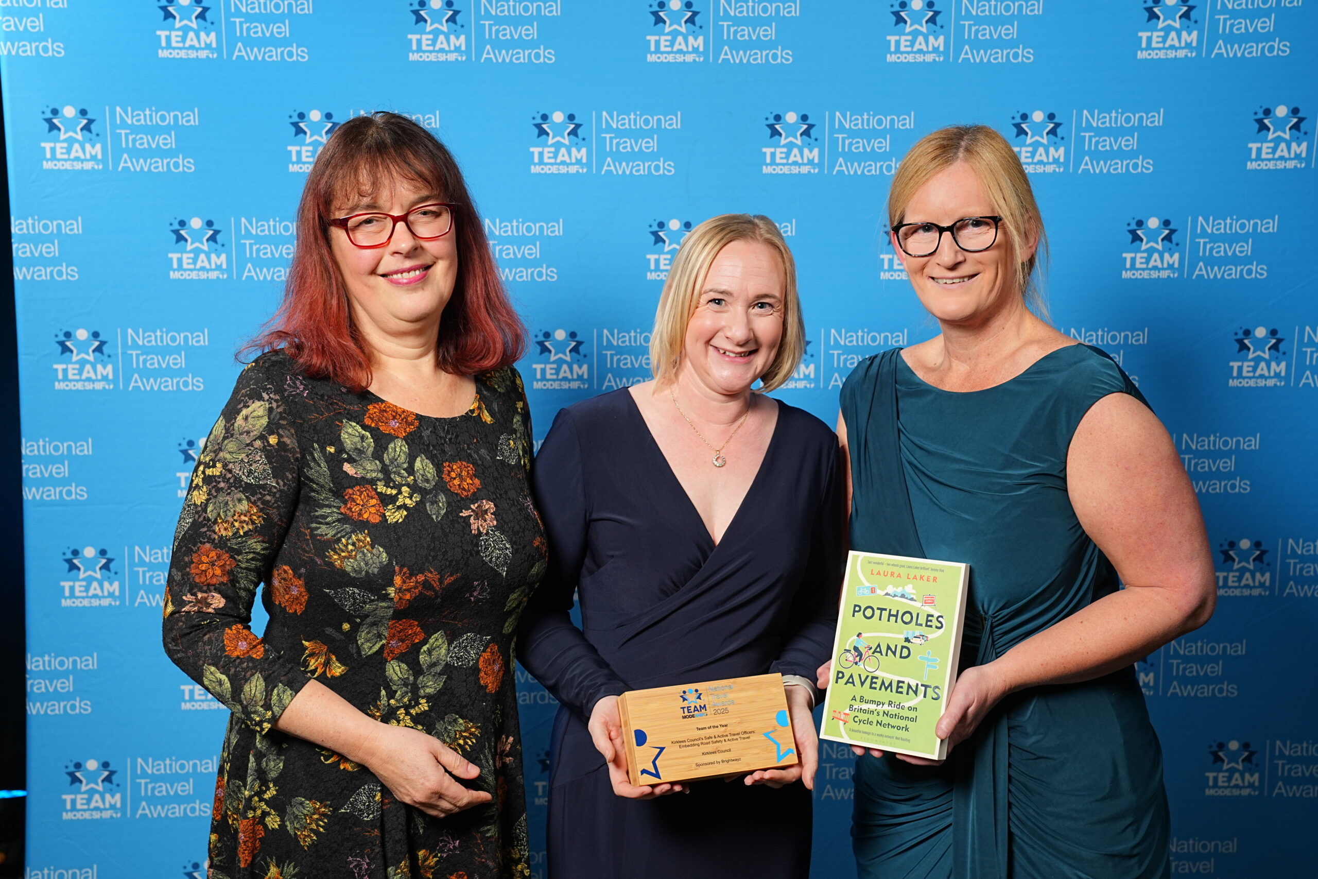 Team of the Year Sponsored by Brightwayz Kirklees Council’s Safe & Active Travel Officers: Embedding Road Safety & Active Travel Kirklees Council Group of people stand smiling, central figures holding their TeamModeshift Award Group of people stand smiling, central figures holding their TeamModeshift Award