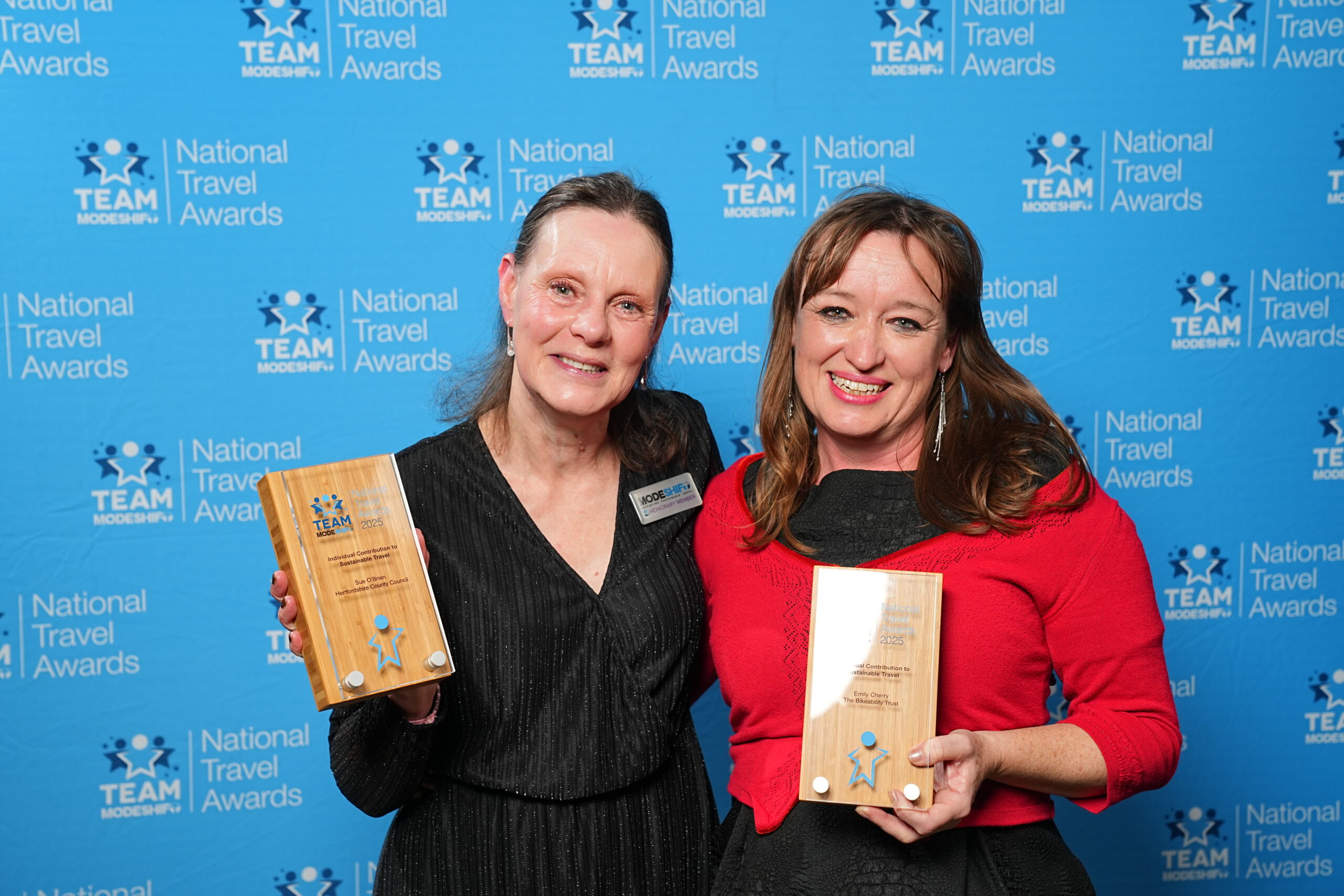 Individual Contribution to Sustainable Travel Emily Cherry, Bikeability Trust Sue O’Brien, Hertfordshire County Council Two women smile at the camera holding their awards.