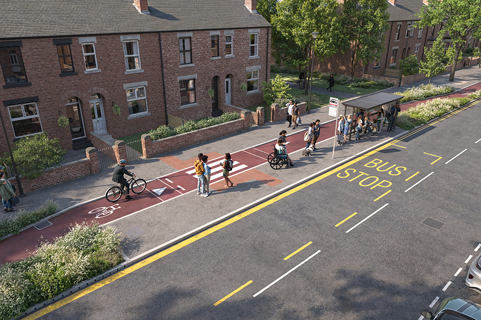 People waiting at a bus stop next to a bike lane and residential brick houses on a sunny day.