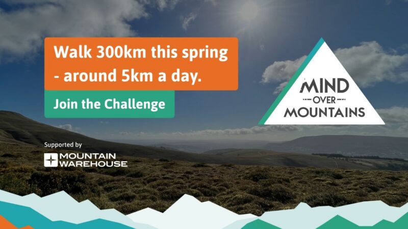 Promotional graphic for "Mind Over Mountains" challenge to walk 300km this spring, averaging 5km daily, supported by Mountain Warehouse, set against a scenic mountainous landscape.