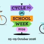 Illustration of people cycling, with a central signpost announcing "CYCLE TO SCHOOL WEEK 2026" and the dates "05-09 October 2026".